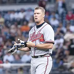 A baseball player in gray