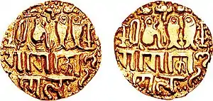 Imperial coin of Emperor Rajaraja I (985–1014). Uncertain Tamilnadu mint. Legend "Chola, conqueror of the Gangas" in Tamil, seated tiger with two fish. of Chola empire