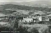 Black and white photograph of the abbey and surrounding area