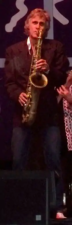 Chris White performing with The Straits at Guilfest 2012