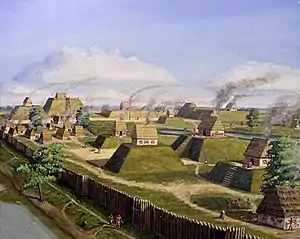 Image 49An illustration of Kincaid Mounds, a city of the Mississippian culture, at its height. The city was located near the Ohio River on the boundary of present day Massac and Pope Counties. Image credit: H. Rowe (from Portal:Illinois/Selected picture)