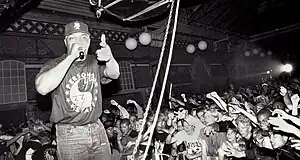 Image 116Swedish hip-hop fans watch Public Enemy perform in 1991. (from 1990s in fashion)