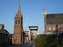 Centre of Nieuwerbrug with the church and toll bridge