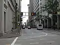 Example of traffic signals mounted on gantries in downtown Cincinnati, Ohio, and integrated with street signage