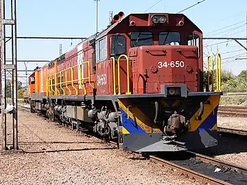 No. 34-650 in Spoornet maroon with NLPI LOG emblems, Capital Park, 6 May 2013