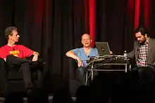 An image of Star Control creators Paule Reiche III (left) and Fred Ford (middle) at the 2015 Games Developer Conference.