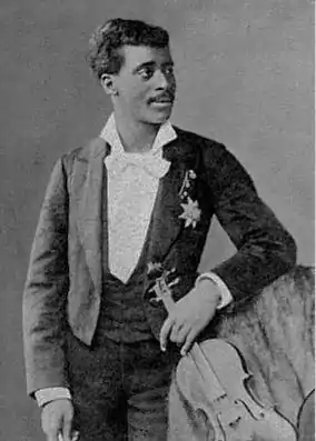 Claudio  Brindis de Salas in 1880 with his Stradivarius and his Prussian decoration "Order of the Black Eagle".