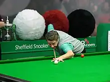 Cliff Thorburn playing a shot