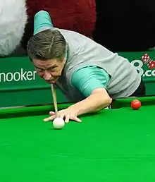 Cliff Thorburn playing snooker