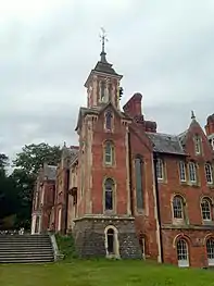 Close up view of the clock tower, restored to working order by Rolls-Royce Limited