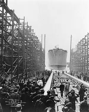 West Cohas slides down the ways at her launching on 4 June 1918