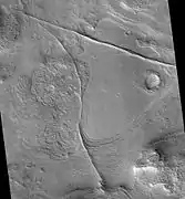 Coloe Fossae Dikes and/or faults, as seen by HiRISE.  Dikes and faults may have produced mineral deposits.