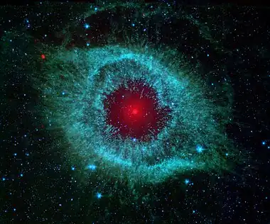 Image 6Helix NebulaPhotograph: NASA/JPL-Caltech/University of ArizonaThe Helix Nebula is a large planetary nebula located in the constellation Aquarius. Discovered by Karl Ludwig Harding, probably before 1824, it is one of the closest to Earth of all the bright planetary nebulae, about 215 parsecs (700 light-years) away. It is similar in appearance to the Cat's Eye Nebula and the Ring Nebula.More selected pictures