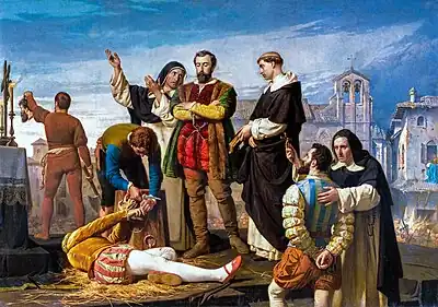 Two men and a priest stand in the center, overseeing the proceedings. A dead body lies on the ground; a man triumphantly lifts up his severed head in the background. A bearded man with hands bound is being brought forward to be executed next.