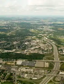 Aerial photo of a freeway through a mostly intustrial area