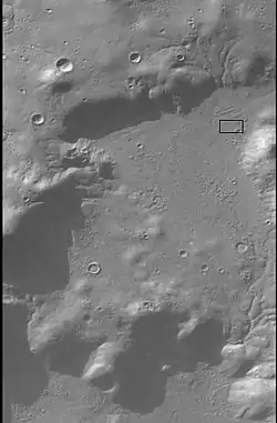 CTX image showing context for the next image.  A group of channels are visible in this image. Image is located in Nereidum Montes.