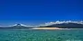 Corangon shoal, made up of mainly crushed corals and white sand, is about 15 minutes boat ride from the shore of barangay Baybay. Mounts Mayon (left), Masaraga (center) and Malinao (right) serve as the background.