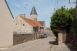 The church and surroundings in Cosqueville