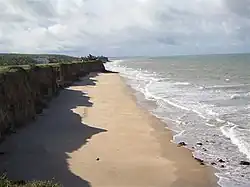 Costa Dourada beach and its cliffs: the first beach in Bahia from south to north.