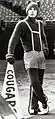 Cougar Mascot standing and leaning on a megaphone