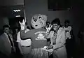 Early costumed Shasta poses with former university president Marguerite Ross Barnett during the 1990s