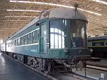 A Ten'ine2 type observation carriage on display in the China Railway Museum. This design was used on the Tairiku express train (Busan–Beijing), but is similar to the Ten'i8 type observation carriage used on the Asia Express. The primary difference is the shape of the observation window.