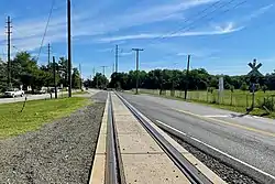 Railroad crossing Main Street near East Spotswood Park