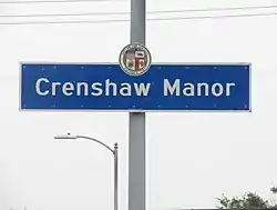 Crenshaw Manor neighborhood sign located at the intersection of Crenshaw and Obama Boulevards