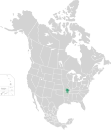 A map of North America showing second level political divisions. An area marked green in the Ozark mountains extending into both Arkansas and Missouri indicates the current range of the Ozark hellbender