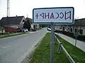 Rovas city limit sign near the pontoon bridge, featuring Hungarian runes