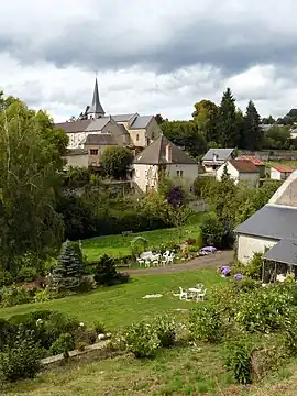 A view of the church and village surroundings in Cussy-en-Morvan