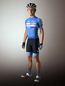 Example of a summer cycling kit comprising a helmet, short-sleeved jersey, mitts, bib shorts, socks and shoes.