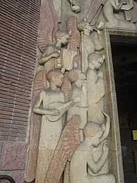 Detail of the portal sculpture; a choir of angels