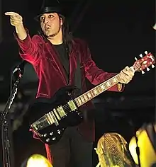 Malakian performing with System of a Down in 2011