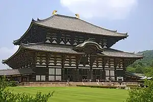 Image 70The Daibutsu-den, within the complex of Tōdai-ji. This Buddhist temple was sponsored by the Imperial Court during the Nara period. (from History of Japan)