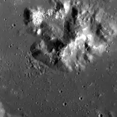 Central peak complex of Damer, showing abundant hollows