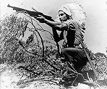 Dan Waupoose, a Menominee chief, training at Algiers, Louisiana, on August 24, 1943.