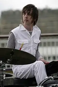 Goffey performing with Supergrass on London's South Bank in 2008