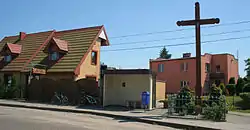 Bus stop Darżlubie. Barber shop (left)