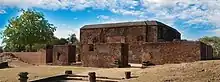 The grave of a famous muslim saint Atash Fakir. Some carved stone pillars and wall inscriptions can be seen in this grave