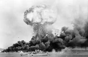 Image 26An oil storage tank explodes during the first Japanese air raid on Darwin on 19 February 1942 (from Military history of Australia during World War II)