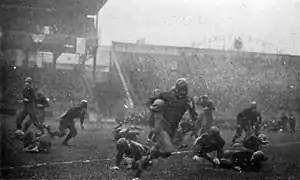 Image 17Tom Davies of Pittsburgh runs against undefeated and unscored upon Georgia Tech in the 1918 game at Forbes Field (from History of American football)