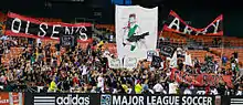 A tifo supporting head coach Ben Olsen during a match against the FC Dallas