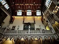 Statues and stained-glass windows inside the Central Hall