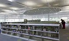 Shelving with books inside the Deanwood Neighborhood Library in 2011.