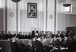 Image 63David Ben-Gurion proclaiming the Israeli Declaration of Independence in 1948 (from History of Israel)