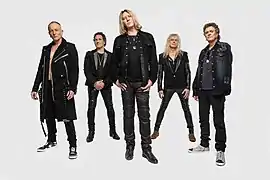 Def Leppard band members in 2018: Phil Collen, Vivian Campbell, Joe Elliott, Rick Savage, Rick Allen.