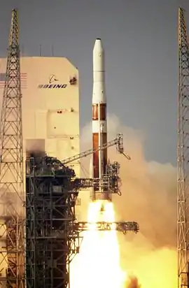 A Delta IV rocket blasts off with the help of GEM 60 solid rocket motors.