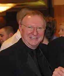 A smiling Dennis Taylor