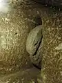 Rolling stone door in the underground town of Derinkuyu, Cappadocia, Turkey